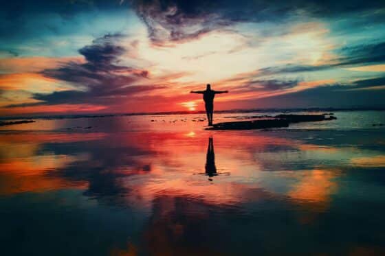 Man in Ocean at sunset