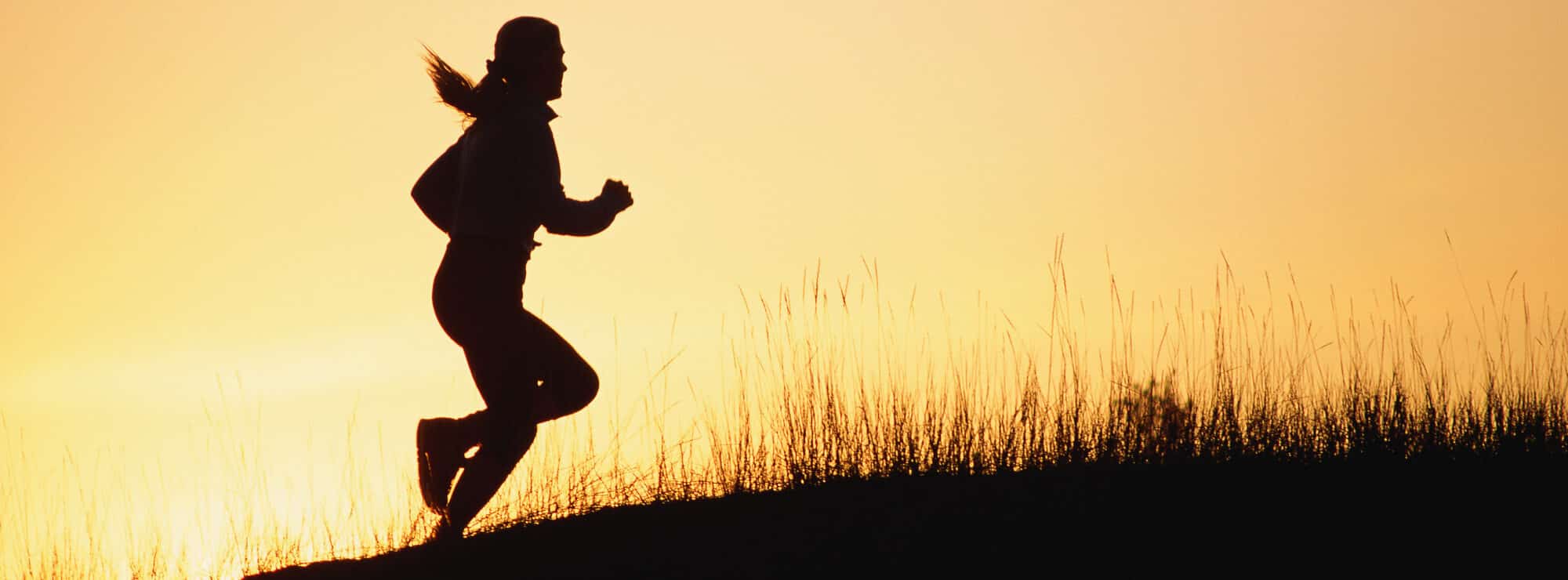 woman running uphill